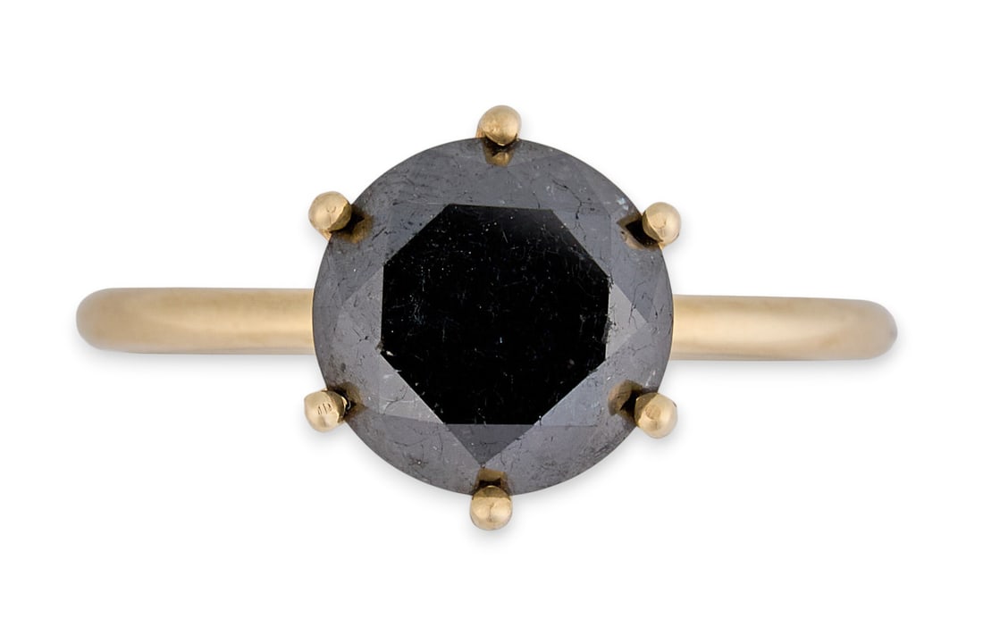 14K Fancy Black Diamond Solitaire Ring: 14K yellow gold solitaire ring with single 3.31 ct fancy black diamond, marked "14K"Size: 7 Total weight: 3.0 gProvenance: Property from a home in San Antonio, Texas