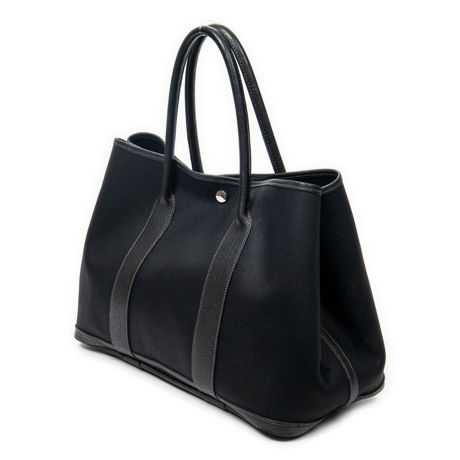 Hermes Garden Party PM Shoulder Bag: Hermes Garden Party PM shoulder bag in black toile officier canvas, with black leather handles, and palladium hardware, stamped I in square (2005), includes dustbag; third-party authenticated 14.