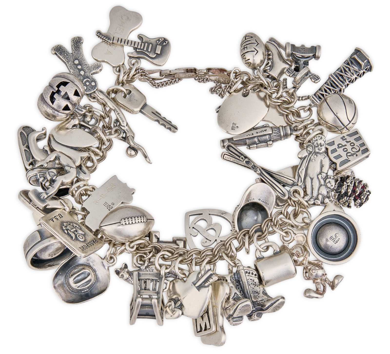 James Avery Sterling Silver Charm Bracelet: James Avery sterling silver charm bracelet, heavy-link sterling silver James Avery bracelet fitted with an extensive assortment of James Avery charms, including novelty, symbolic, religious, and