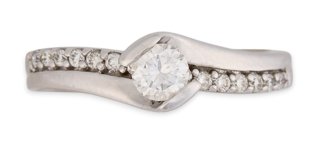 14K Diamond Bypass Ring: 14K white gold diamond bypass ring, size 5, gold and diamond tested, marked "14K" Total weight: 3.6 gProvenance: Property from a North San Antonio, Texas collection