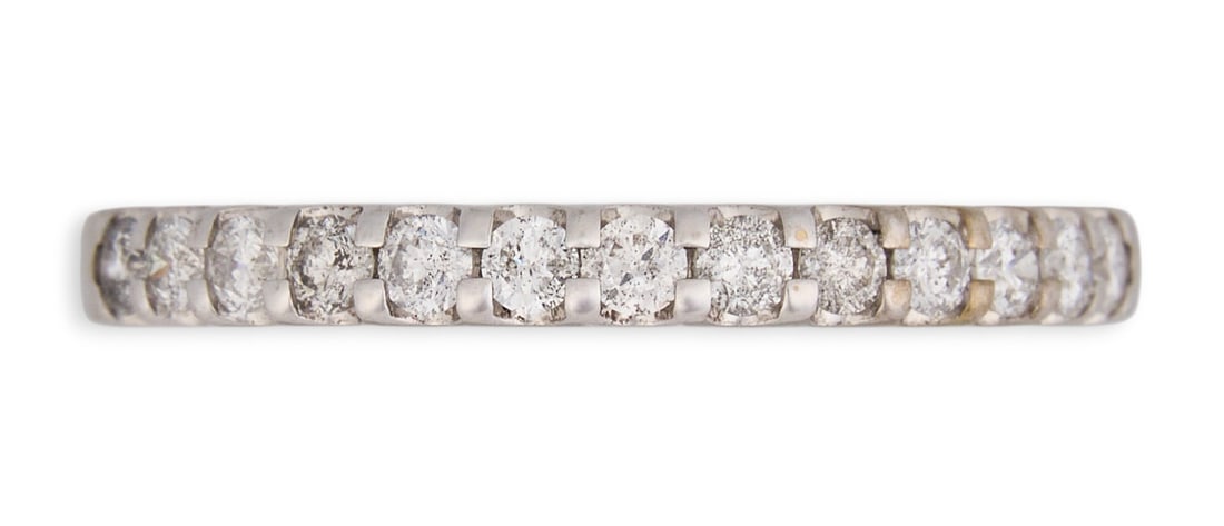 10K Diamond Band: 10k white gold band with diamonds, size 7, marked "10k"Total weight: 1.9 gProvenance: Property from a North San Antonio, Texas collection