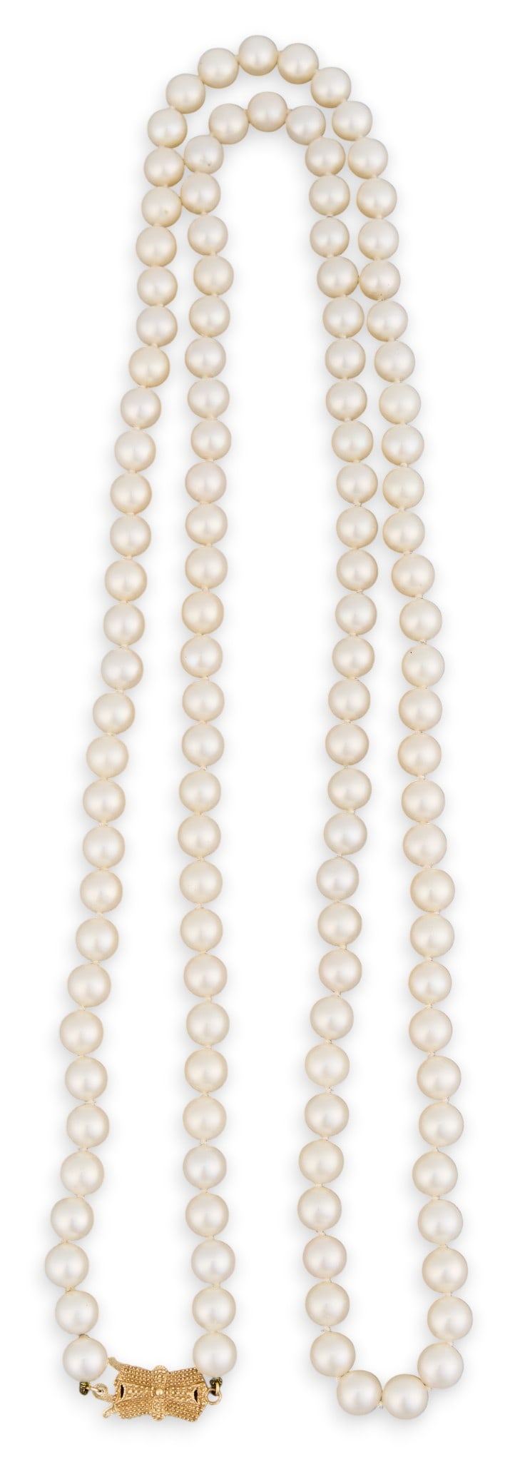 14K Mikimoto White South Sea Pearl Strand: Mikimoto white south sea pearl strand, with 14K yellow gold clasp, clasp marked "585"Length: 36 in. Total weight: 51.8 gProvenance: Property from a home in Medina, Texas
