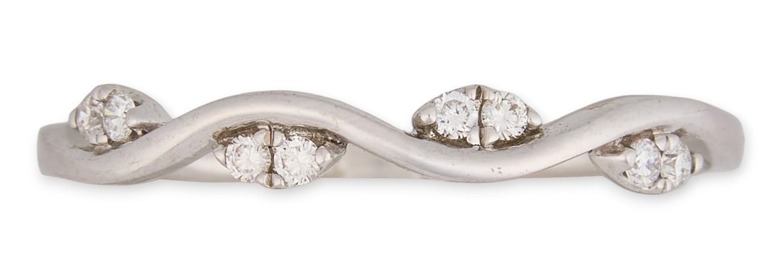 14K Diamond Wave Ring: 14k white gold diamond ring with wavy design, size 6.5, marked "14k", gold and diamond test Total weight: 1.6 g Provenance: Property from a North San Antonio, Texas collection