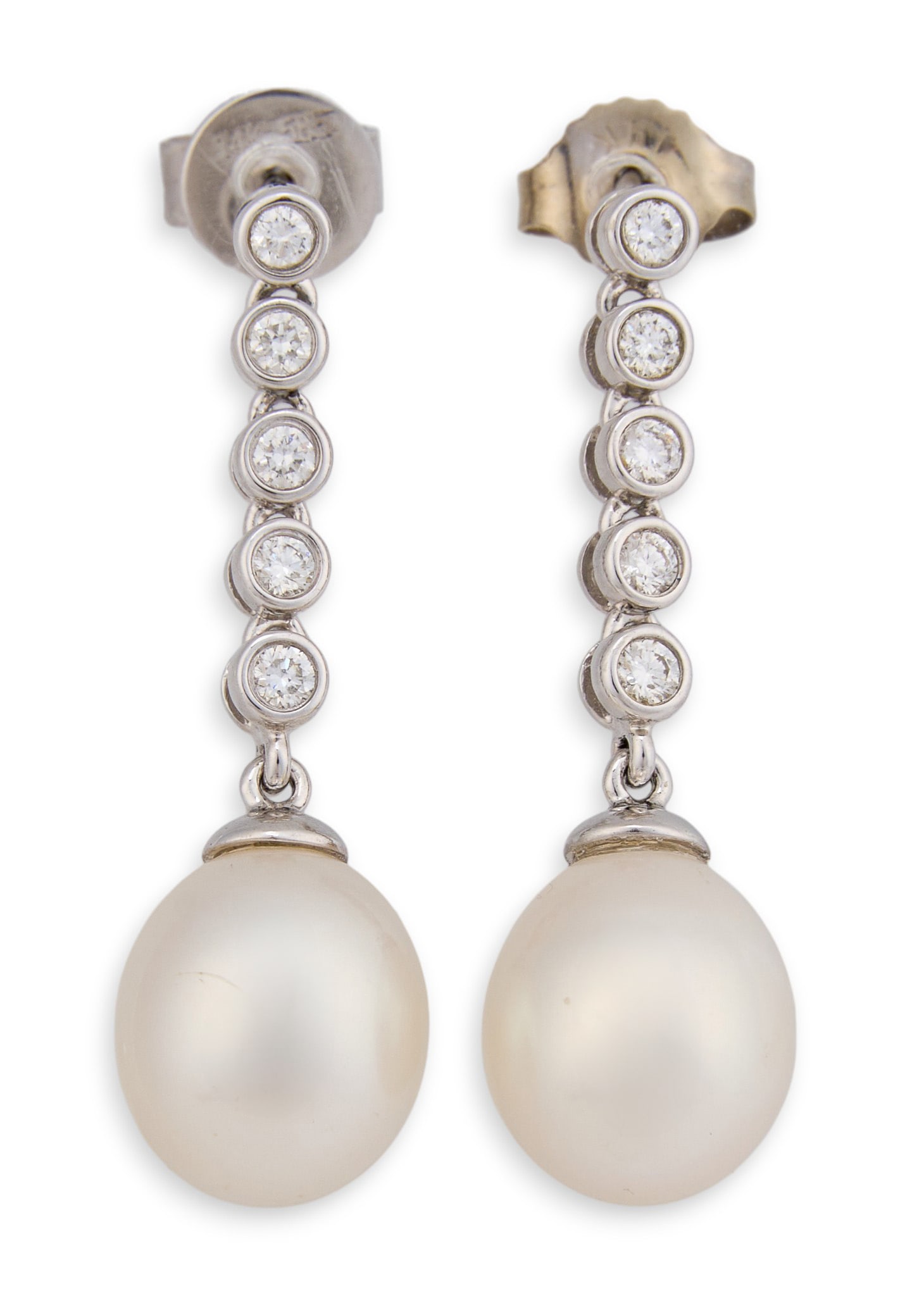 Pair of 14K Diamond Solitaire Earrings: Pair of 14k white gold diamond solitare earrings, with backs, marked "14k" and "585" Total weight: 3.9 g Total carat weight: 0.20