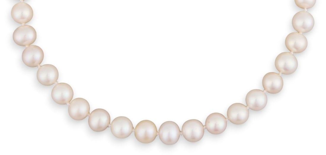 14K Cultured White Freshwater Pearl Necklace: Cultured white freshwater pearl necklace, with 14K yellow gold clasp, marked "14K" Length: 16 inch Provenance: Property from a North San Antonio, Texas collection