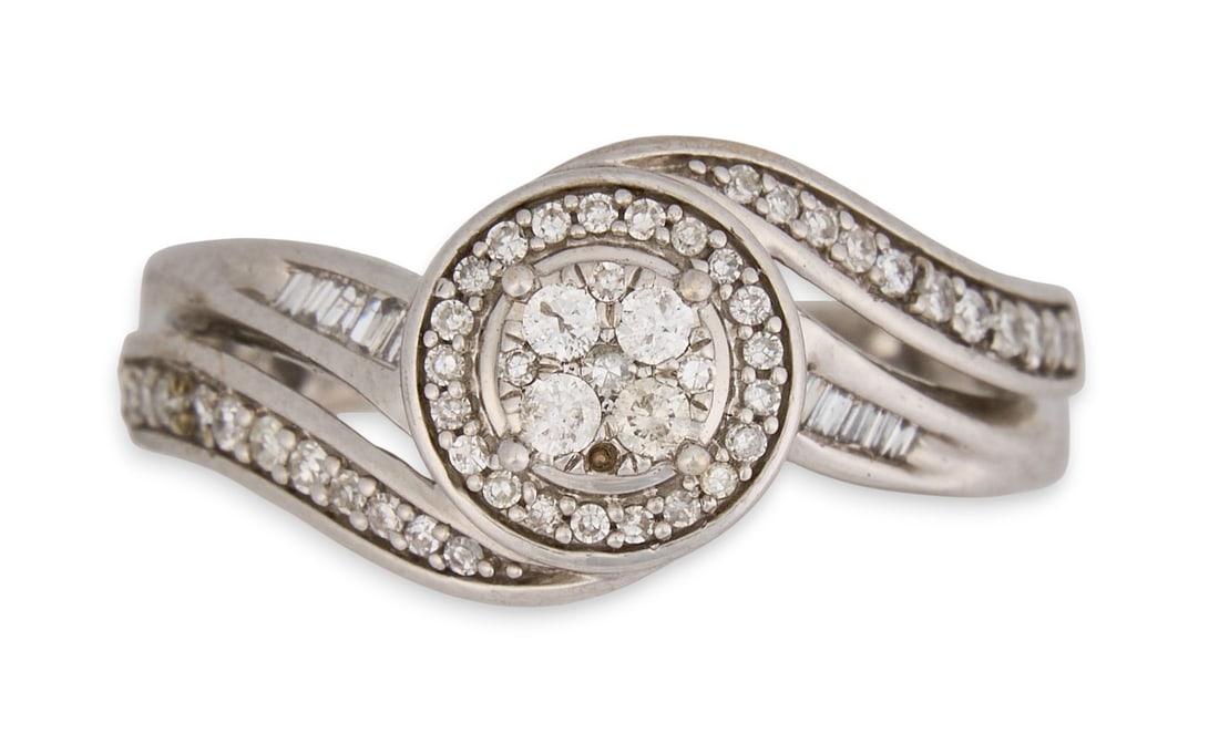 10K Diamond Halo Ring: 10K white gold diamond halo cluster ring Total carat weight: 0.57 Provenance: Property from a North San Antonio, Texas collection