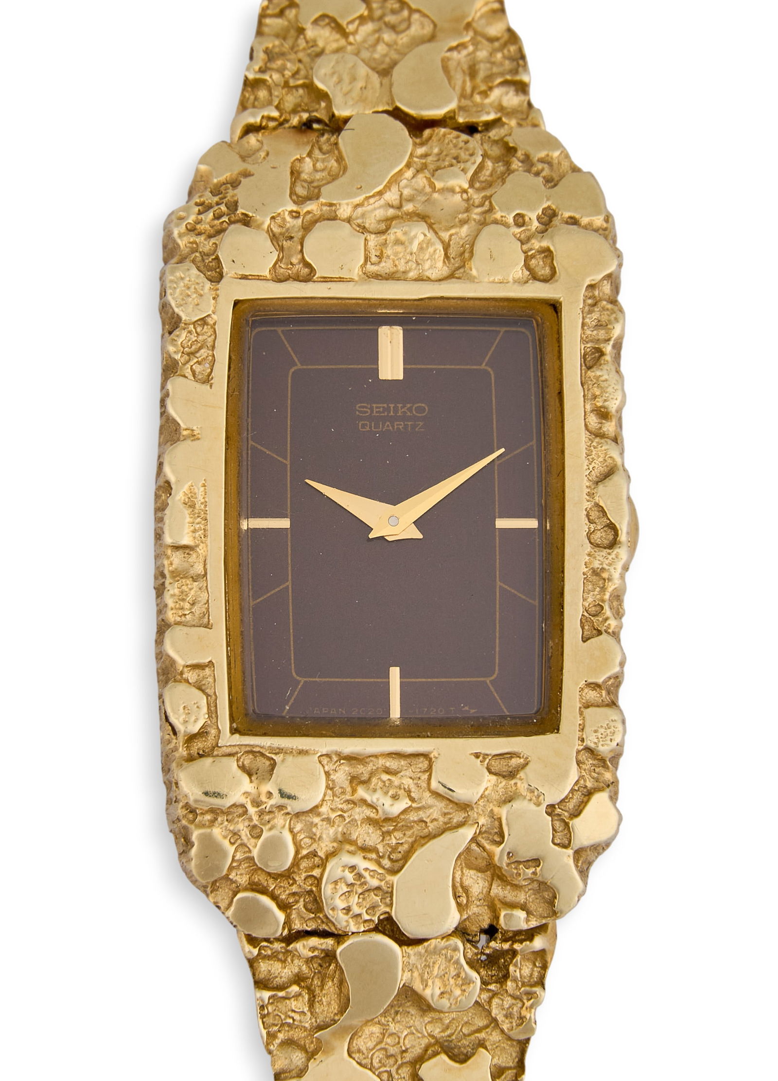 14K Seiko Gold Nugget Watch: Vintage Seiko wristwatch, rectangular black dial with gold-tone baton markers and hands, housed in a textured 14K yellow gold case with matching articulated bracelet, Quartz movement, stainless steel