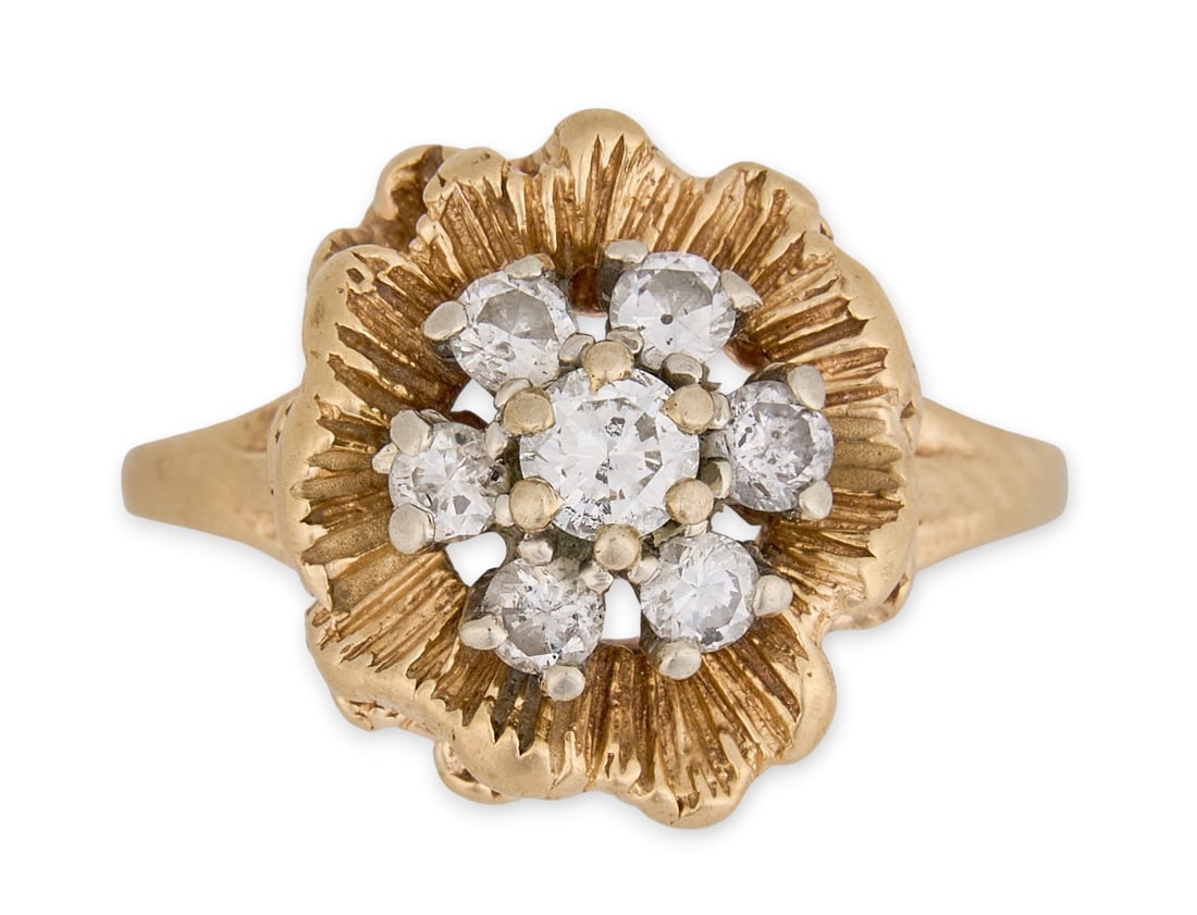 14K Flower Ring: 14K yellow gold diamond cocktail ring, cluster of seven prong set round diamonds set in a floral motif (approx.0.4 ctw), marked "14K" and "Denmark" Size: 6.5Total weight: 4.9