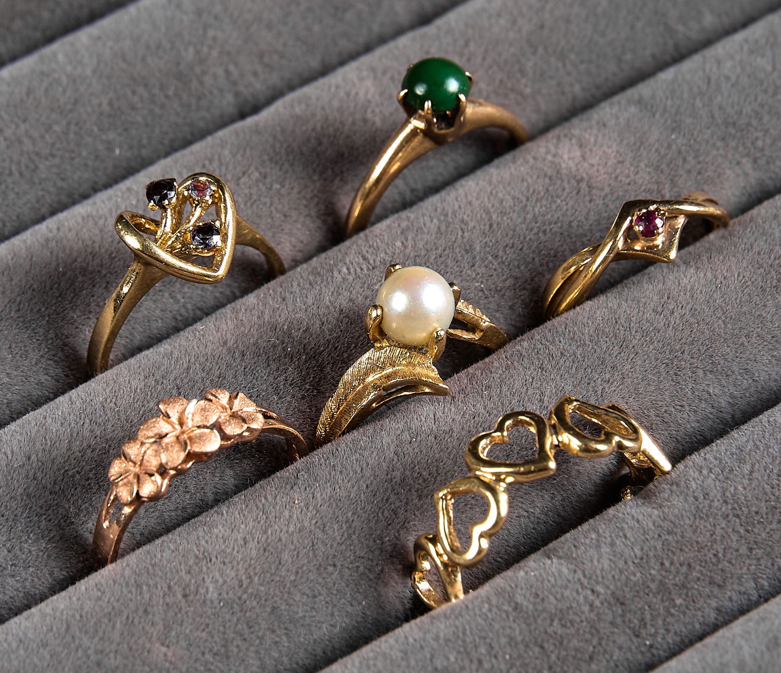 (6) Assorted 14K Rings: Collection of six 14K yellow gold rings, in various sizes and styles, sizes range from 6-10Total weight: 16.8 gProvenance: Property from a home in San Antonio, Texas