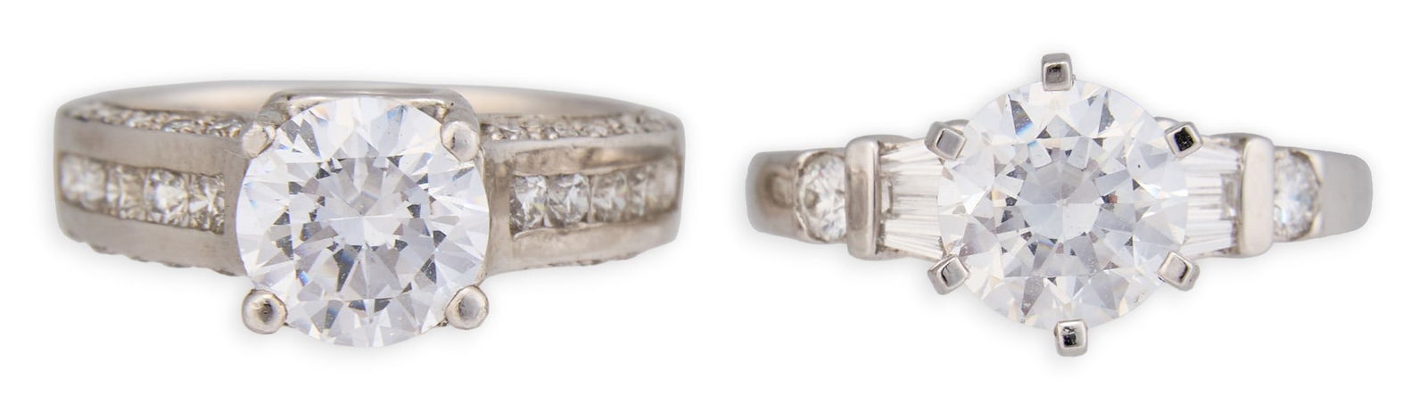 (2) Platinum Ring Settings: Two platinum engagement ring settings, with cubic zirconia center stones, marked "PLAT" and "PT950", sizes 4 and 5Total weight: 13.6 gProvenance: Property from a North San