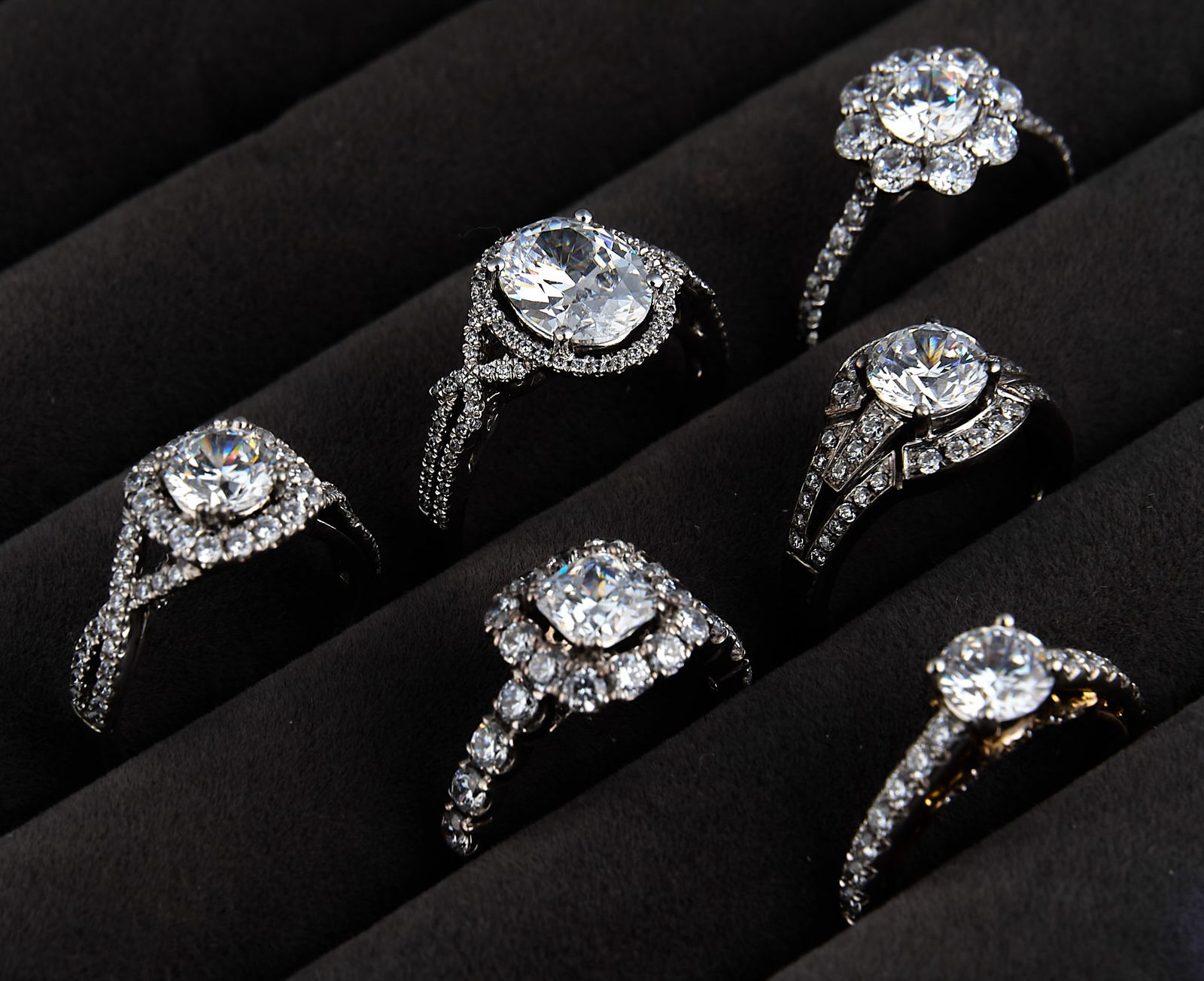 (6) Engagement Ring Settings: Six engagement ring settings, four sterling silver, with cubic zirconia throughoutProvenance: Property from a North San Antonio, Texas collection