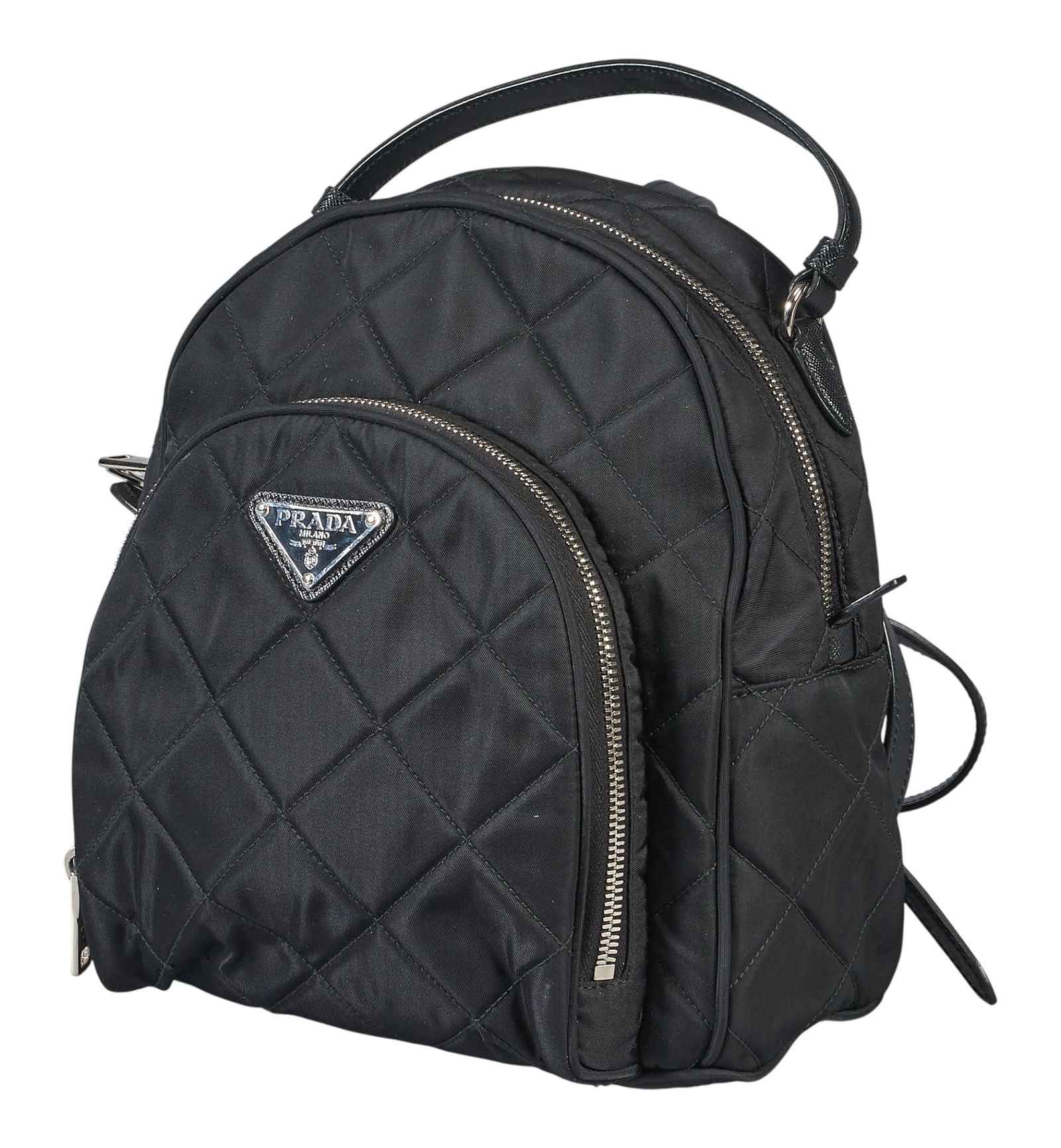 Prada Black Nylon & Leather Backpack: Prada Nylon Tessuto Impuntu mini backpack in quilted black nylon with black leather straps, and silver hardware, includes sealed Certificate of Authenticty11 in. x 9.5 in. x 5 in. Condition AA;
