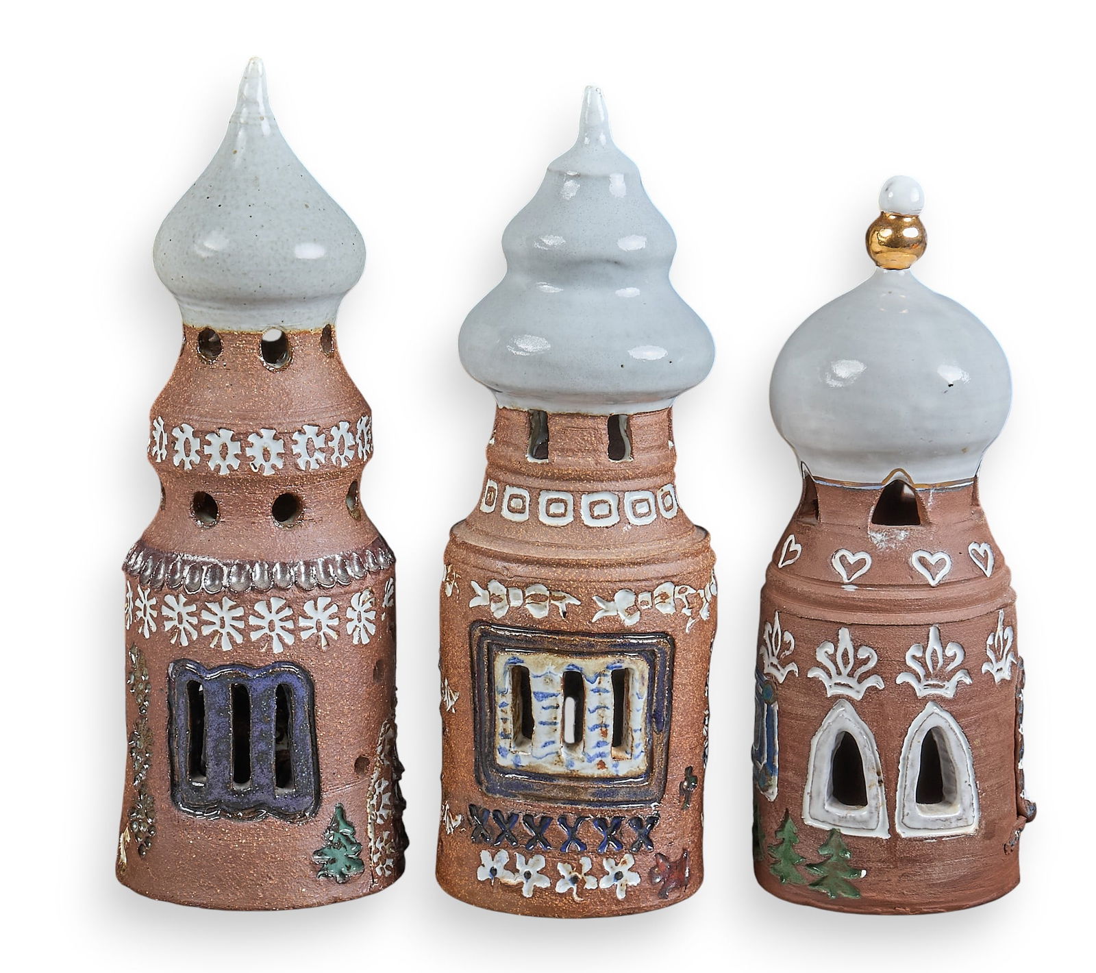 (3) Nancy Pawel Christmas Castles: Nancy Emma Ray Pawel (Texas / Massachusetts, 1928-2021) three vintage glazed pottery castles with golden detailing, all signed, and dated 1992, 1997, and 1997height 13 in. x diameter 4.5 in. /