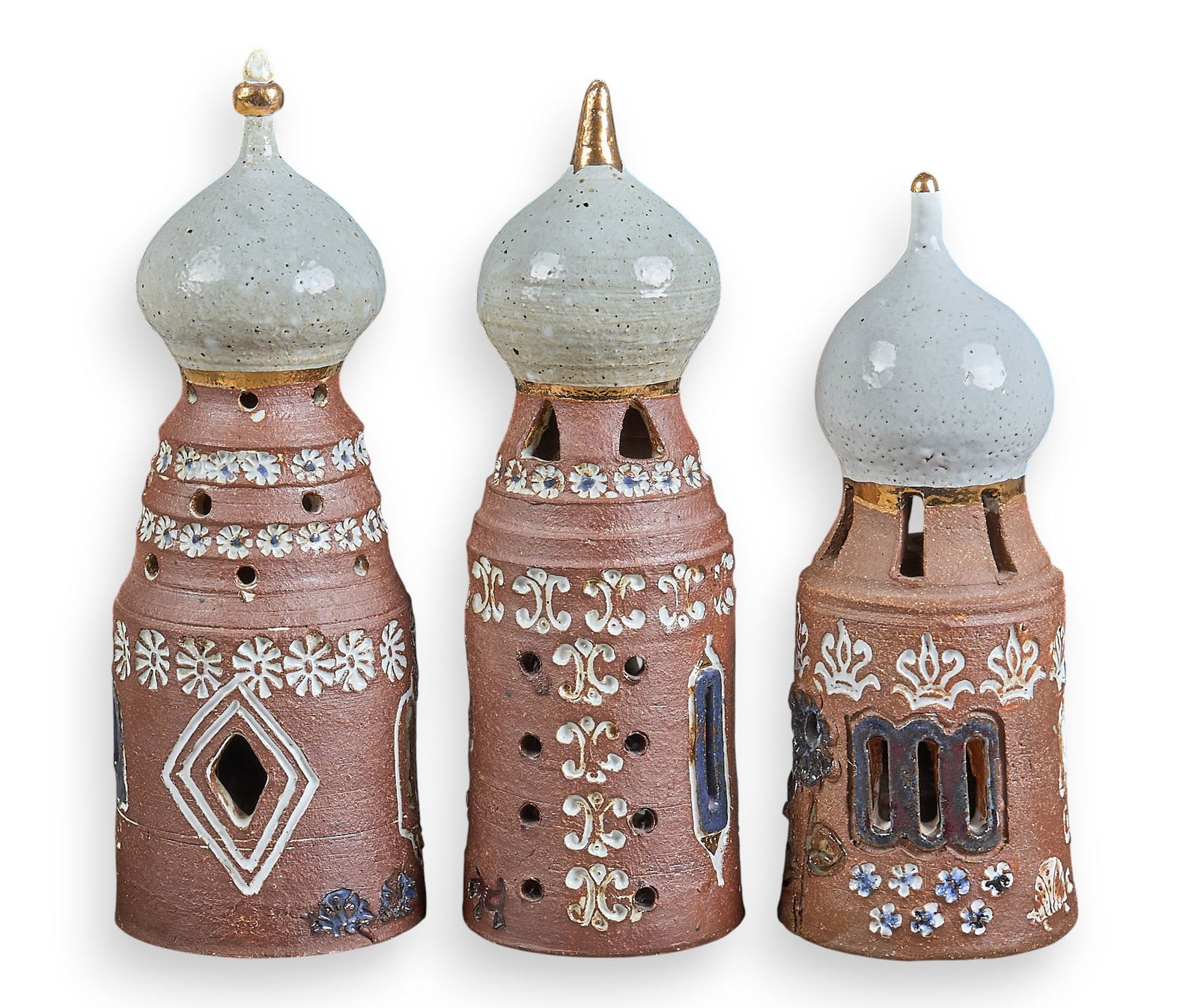 (3) Nancy Pawel Christmas Castles: Nancy Emma Ray Pawel (Texas / Massachusetts, 1928-2021) three vintage glazed pottery castles with golden detailing, all signed, and dated 1993, 1194, and 1999; called a "Christmas Castle"