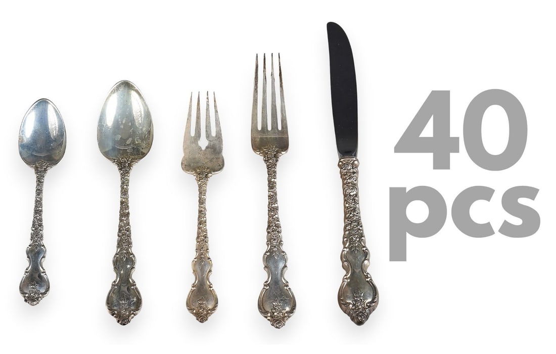 "Du Berry" by International Sterling Partial Flatware Set: International Sterling partial sterling silver flatware set of 40 pieces, marked "International Sterling" Includes: 8 forks 8 knives 8 dessert spoons 8 spoons 8 salad forks 