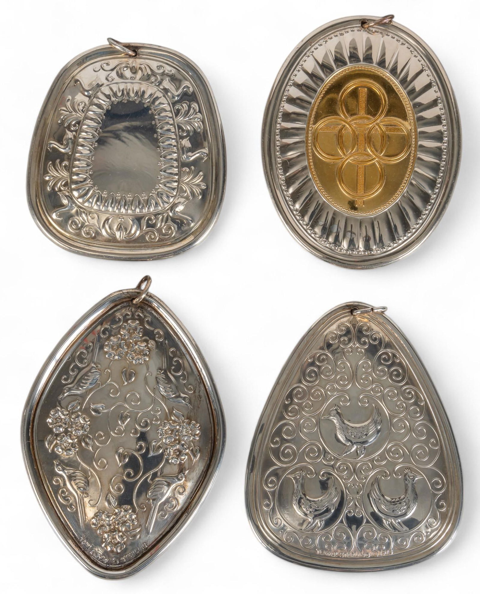 (4) Towle Sterling Silver Ornaments: Set of four Towle sterling silver ornaments, 1973-1976Total weight: 3.12 oztProvenance: Property from a home in San Antonio, Texas