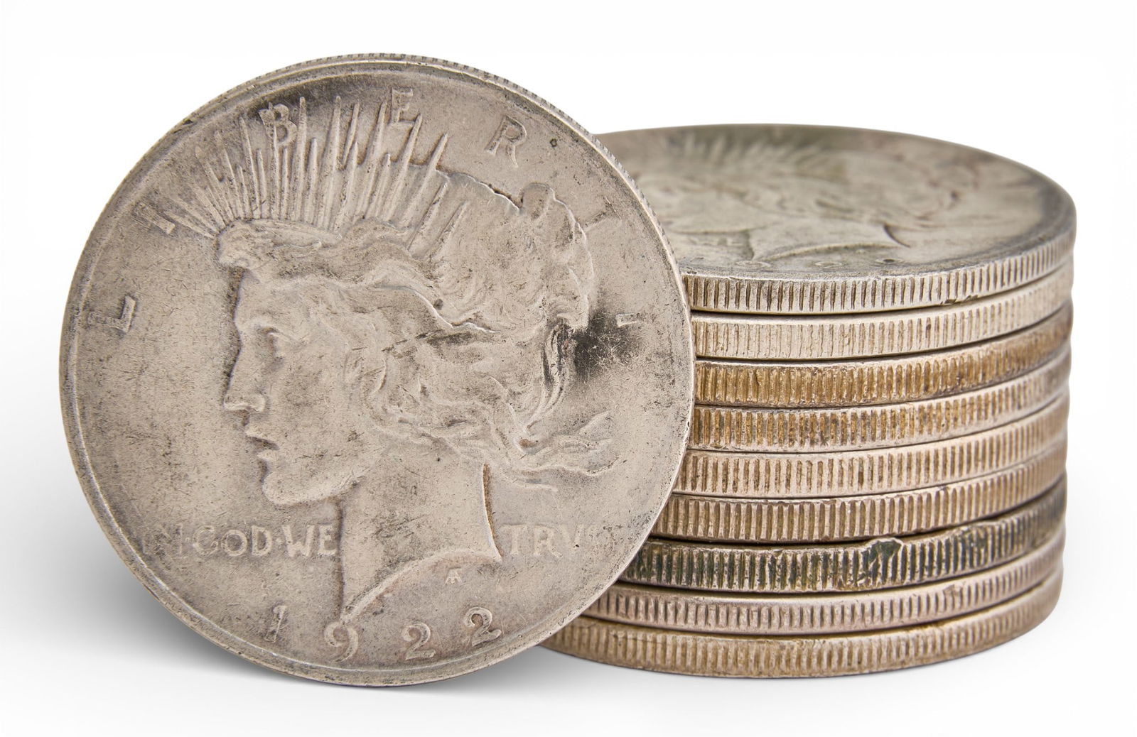 (10) Assorted Silver Peace Dollars: Ten assorted Morgan silver dollars, with years 1922 and 1923Total weight: 8.56 oztProvenance: Property from a home in San Antonio, Texas