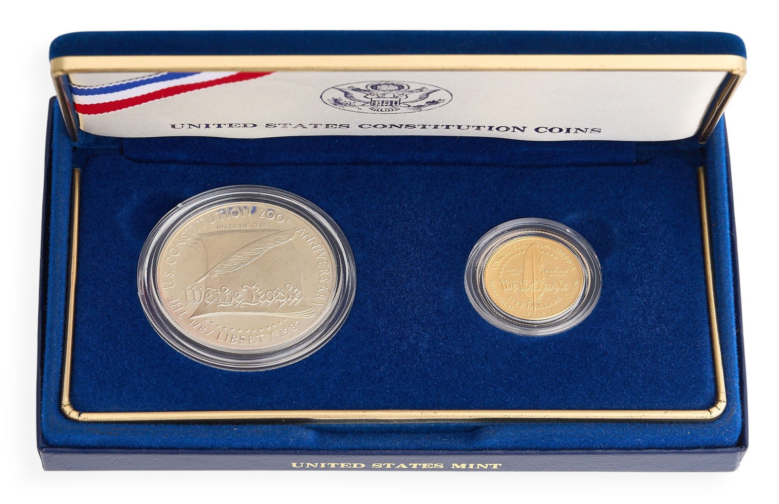 United States Constitution 1987 Coin Set: United States Constitution 1987 two-coin set, with silver dollar and gold five dollar, in presentation case, with certificate of authenticity Provenance: Property from a home in Spring Branch, Texas