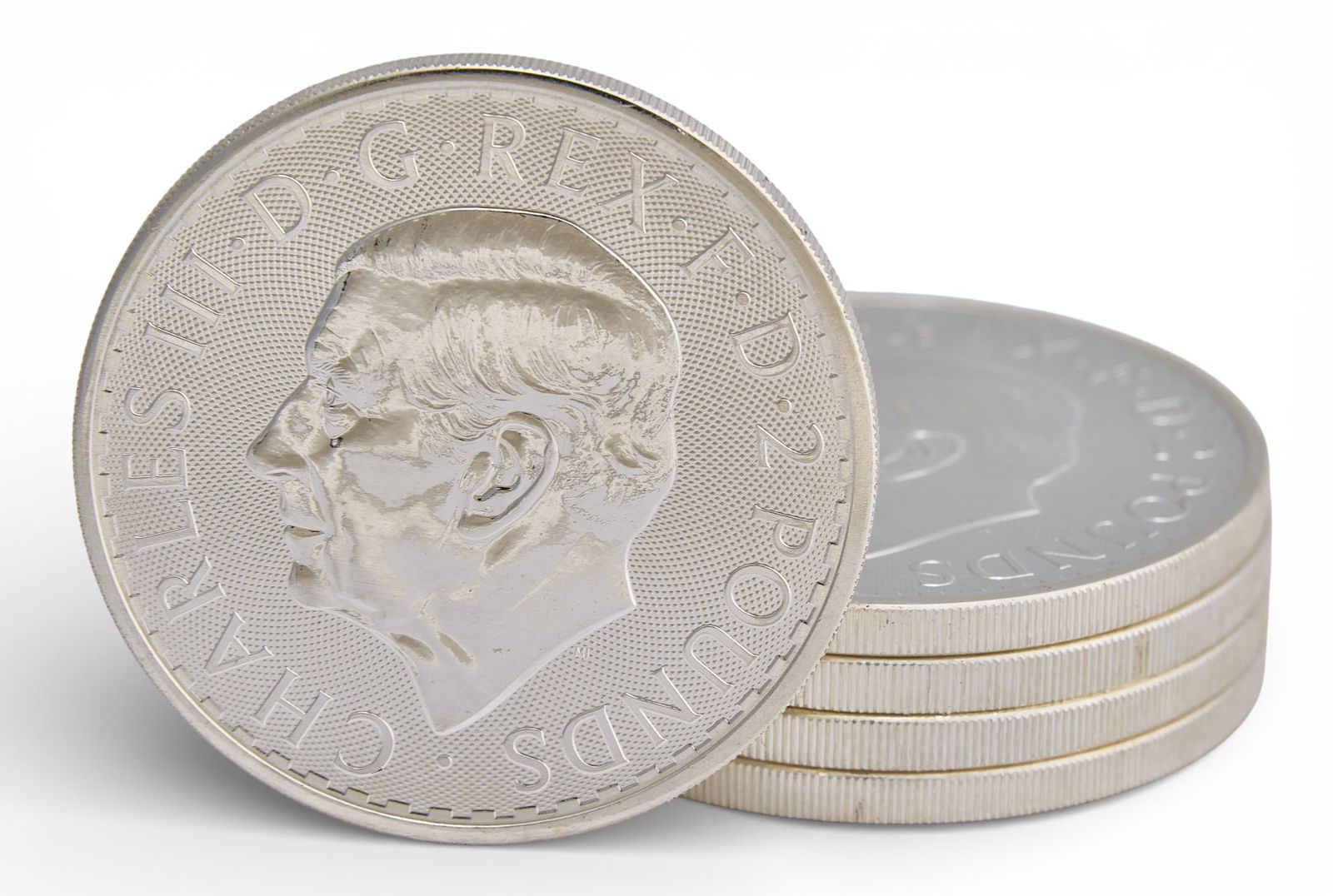 (5) English Silver Britannia Coins: Five English silver Britannia coins, each weighing one ounce fine silver Provenance: Property from a home in San Antonio, Texas