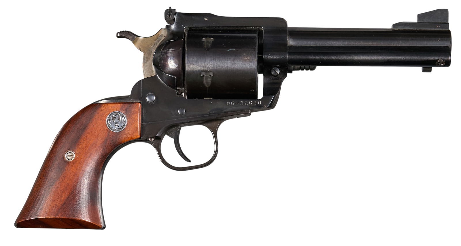 Ruger New Model Super Blackhawk 44 MAG Revolver: Serial: 86-32630Manufacturer: RugerModel: New Model Super BlackhawkCaliber: 44 MAGBarrel length: 4.25 in.OAL: 10.5 in.Condition: Good; light wear & handling marks throughout; some light oxidation;