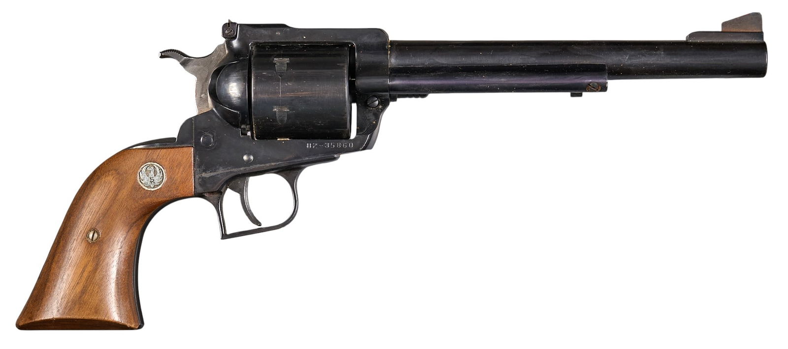 Ruger New Model Super Blackhawk 44 MAG Revolver: Serial: 82-35860Manufacturer: RugerModel: New Model Super BlackhawkCaliber: 44 MAGBarrel length: 7.5 in.OAL: 13.5 in.Condition: Good; light wear & handling marks throughout; oxidation on screws; f