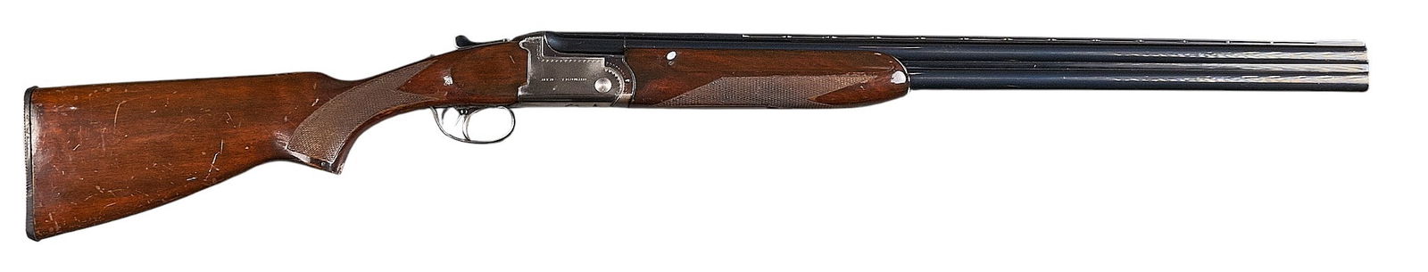 Spanish Aya Yeoman 12 Gauge Over Under Shotgun: Serial: 102791Manufacturer: Aya-Aguirre & Aranzabal, SpainModel: YeomanCaliber: 12 GaugeBarrel length: 28 in.OAL: 45.25 in.LOP: 14.5 in.Condition: Good; wood stock & forend have moderate wear