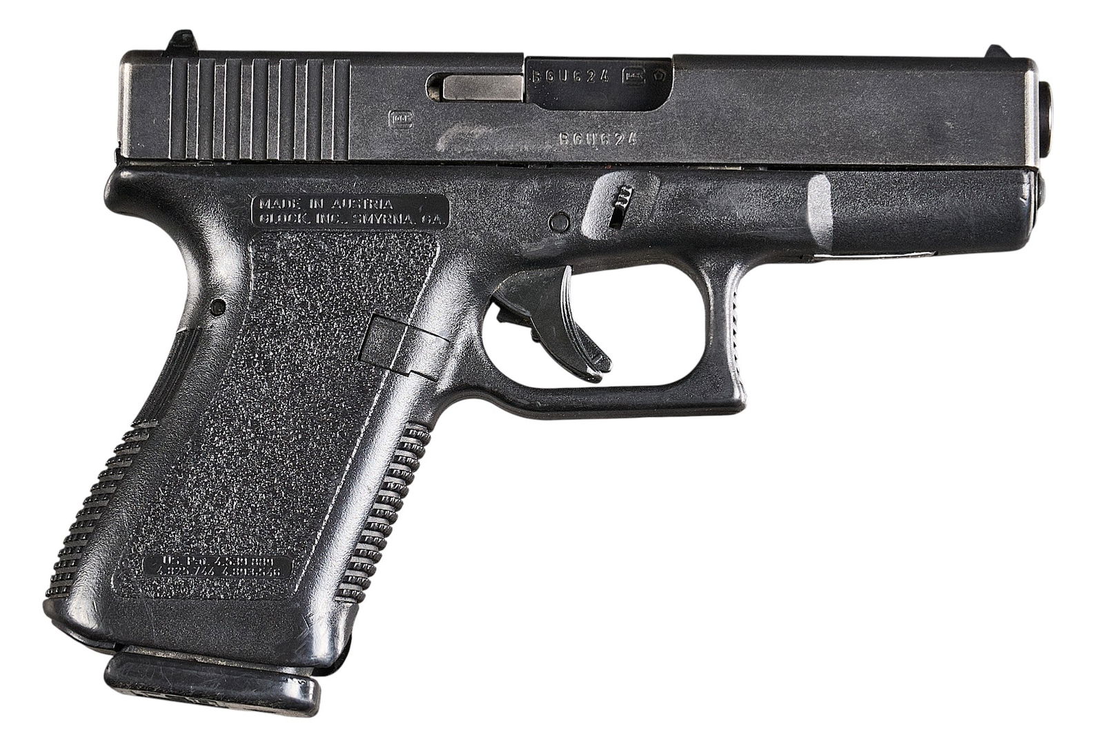 Glock 19 Gen 2 9mm Semi Auto Pistol: Serial: BGU624USManufacturer: Glock Model: 19 Gen 2Caliber: 9mmBarrel length: 4 in.OAL: 6.875Condition: Good; wear & handling marks throughout; finish on slide is worn & scratched; barrel