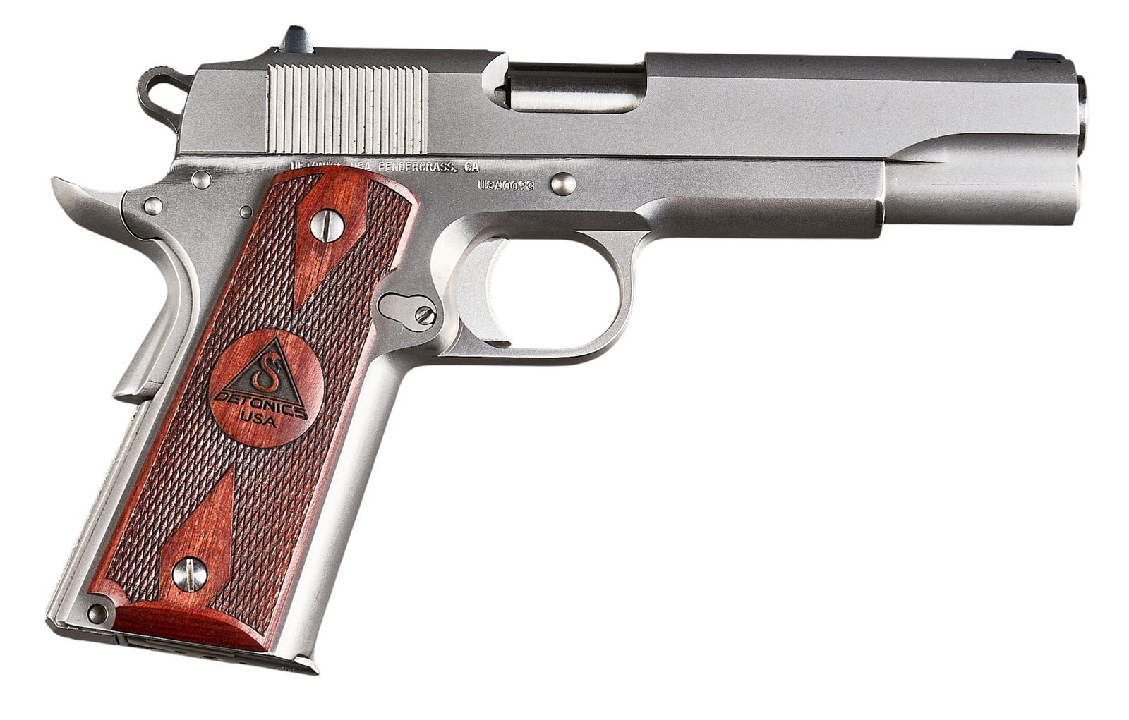 Detonics Model 9-11-01 45 ACP Semi Auto Pistol: Serial: USA0093Manufacturer: Detonics USAModel: 9-11-01Caliber: 45 ACPBarrel Length: 5 in.OAL: 8.875 in.Condition: Very Good; wood grips have very slight signs of wear; slide & frame have very lig