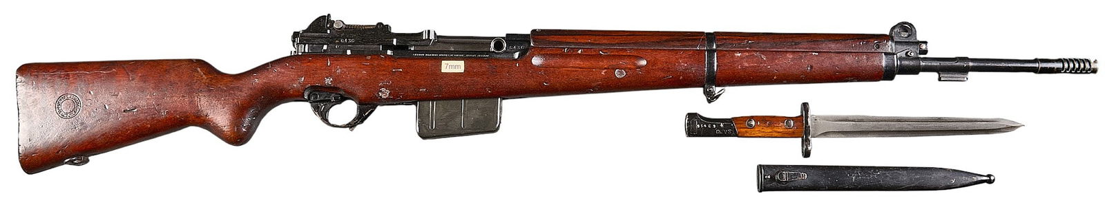 Venezuelan Contract FN 49 7mm Mauser Semi Auto Rifle W/ Bayonet: Serial: 6436Manufacturer: FNH-Belgium Model: FN 49Caliber: 7mm MauserBarrel Length: 24.5 in. w/ muzzle brakeOAL: 45.5 in.Condition: Good; wood stock & handguard have wear & patina commens