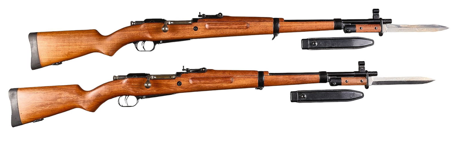 Near Mint Sequential Colombian Madsen M47-58 Rifles W/ Matching Bayonets: Serial: (1) 5616-58; (2) 5617-58Manufacturer: Madsen M. G/A.-Denmark / Fuerzas Armadas-ColombiaModel: M47-58Caliber: 30-06Barrel Length: 23 in. OAL: 43.5 in.Condition: Near Mint; very light handl