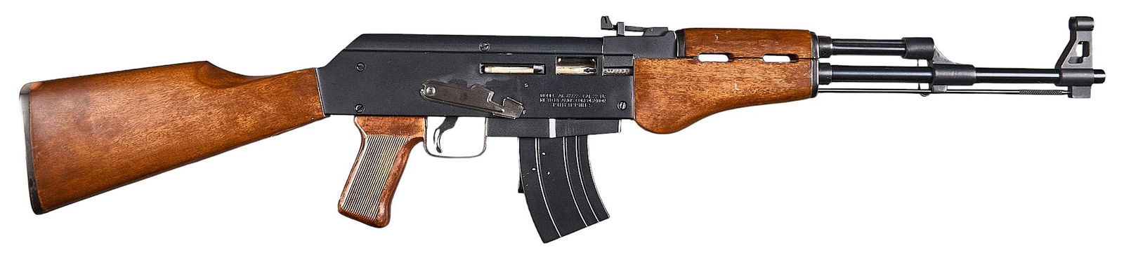 Armscorp AK 47/22 22 LR Semi Auto Rifle: Serial: A774469Manufacturer: Arms Corporation-Philippines / KBI, Inc. ImportModel: AK 47/22Caliber: 22 LRBarrel length: 18 in.OAL: 37.75 in.Condition: Very Good; minor wear & handling marks; bore