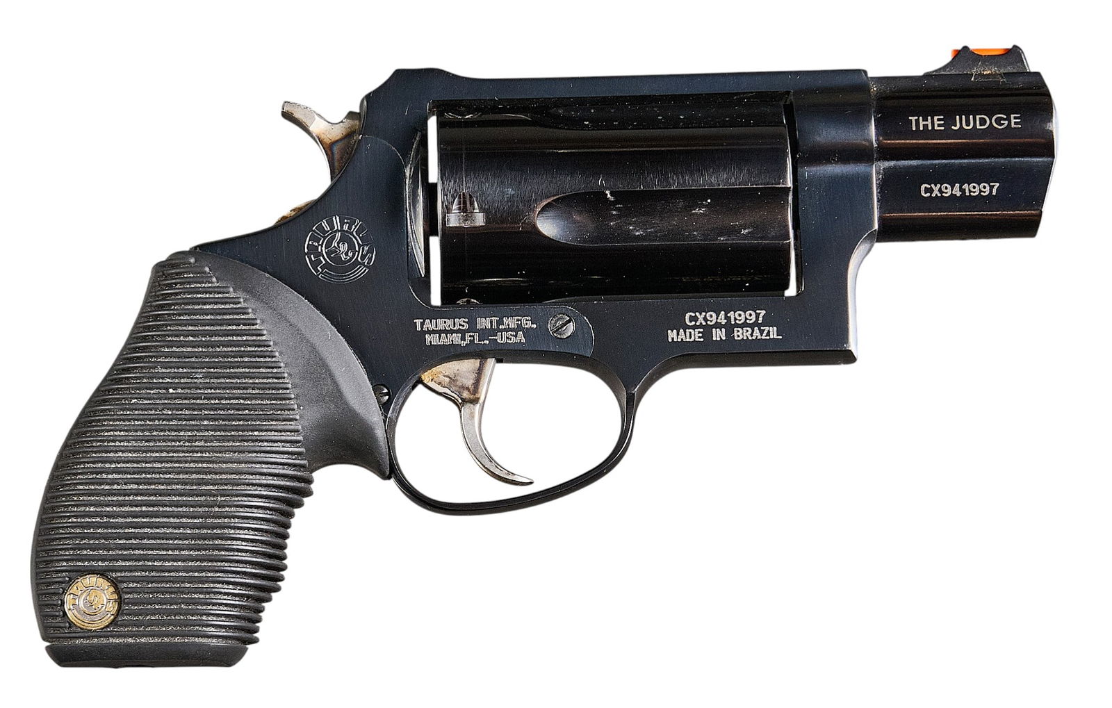 Taurus Judge Public Defender 45 LC / 410 Revolver: Serial: CX941997Manufacturer: Taurus-Brazil / Taurus Int. Mfg.Model: Judge Public DefenderCaliber: 45 LC / 410 boreBarrel Length: 2.125 in.OAL: 7.75 in.Condition: Good-used condition; light handling m
