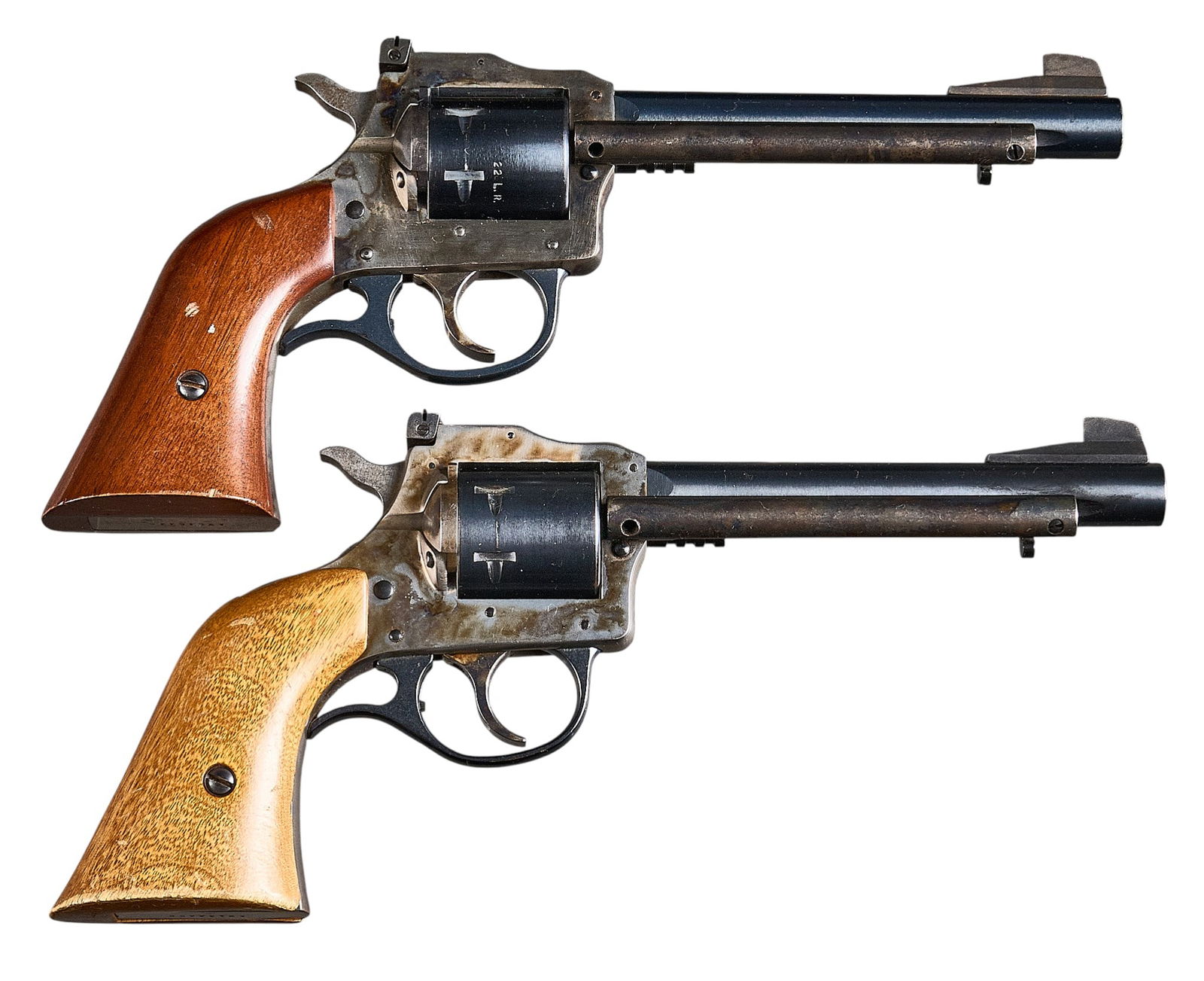Pair of H&R Model 686 22 LR Revolvers: Serial: (1) AX045446; (2) AX144458Manufacturer: H&R Inc.Model: 686Caliber: 22 LRBarrel length: 5.5 in.OAL: 10.75 in.Condition: (1) Good; light wear & handling marks w/ some light rusting; some