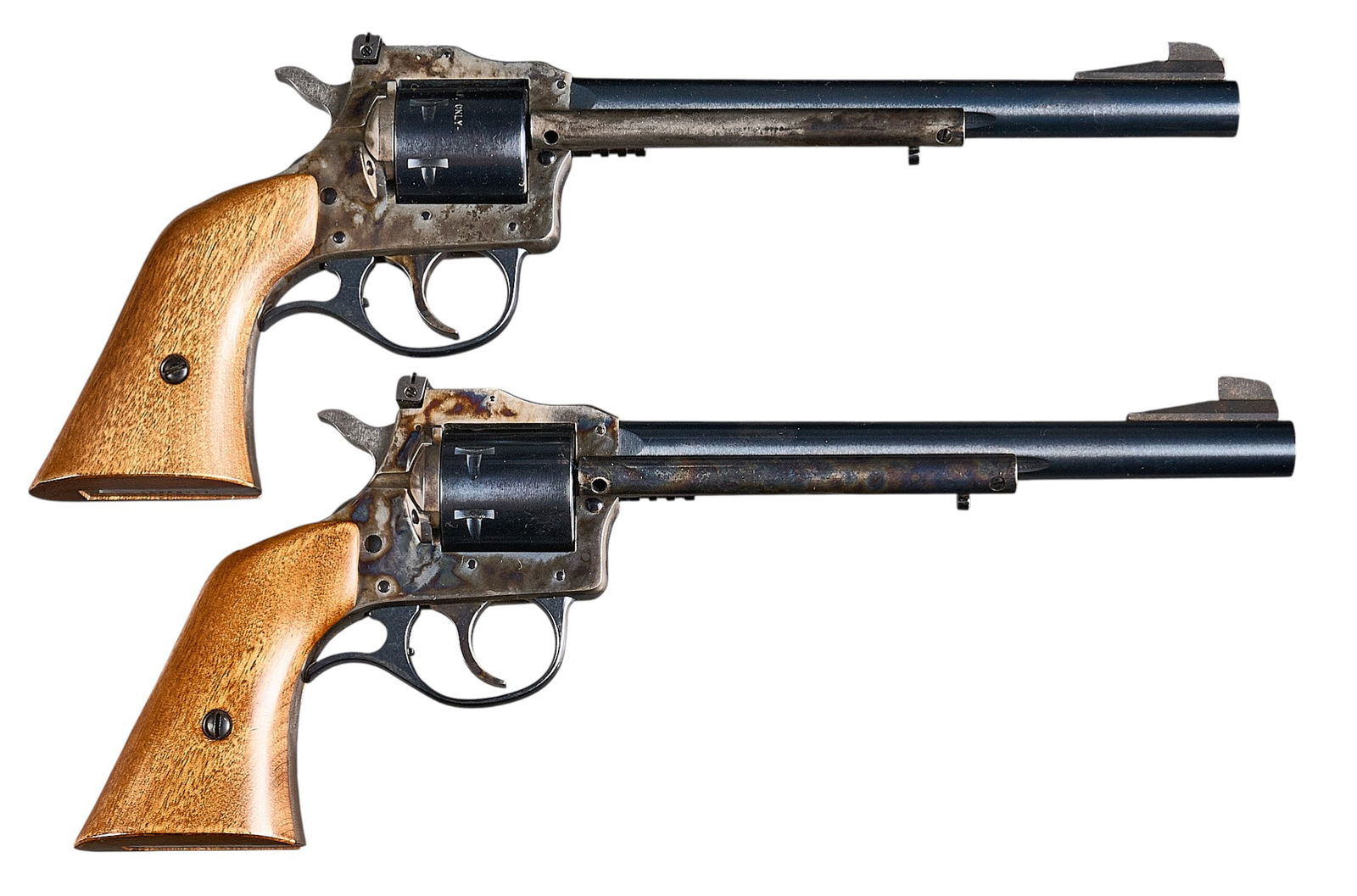 Pair of H&R Model 686 22 Mag / 22 LR Revolvers: Serial: (1) AX089643; (2) AX090040Manufacturer: H&R Inc.Model: 686Caliber: 22 WMRF (Mag) / 22 LRBarrel length: 7.625 in.OAL: 13 in.Condition: (1) Good; mostly light wear/handling marks; some light