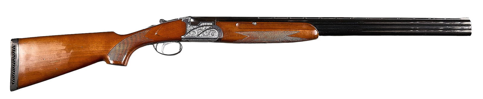 Felix Sarasketa Sporter 12 Gauge Over Under Shotgun: Serial: V0410Manufacturer: Felix Sarasketa (Sarasqueta)-Eibar, SpainModel: Sporter O/UCaliber: 12 GaugeBarrel length: 28 in.OAL: 45.5 in.LOP: 14.5 in.Condition: Good; wood stock & forend have