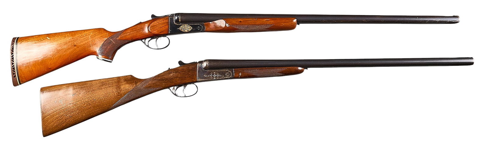 Pair of Zabala Boxlock 12 Gauge SXS Shotguns: Serial: (1) 178800; (2) 101519Manufacturer: Zabala Hermanos-Eibar, Spain; (2) Kassnar ImportsModel: (1) LB71; (2) BoxlockCaliber: 12 GaugeBarrel length: (1) 26 in.; (2) 28 in.OAL: (1) 43 in.