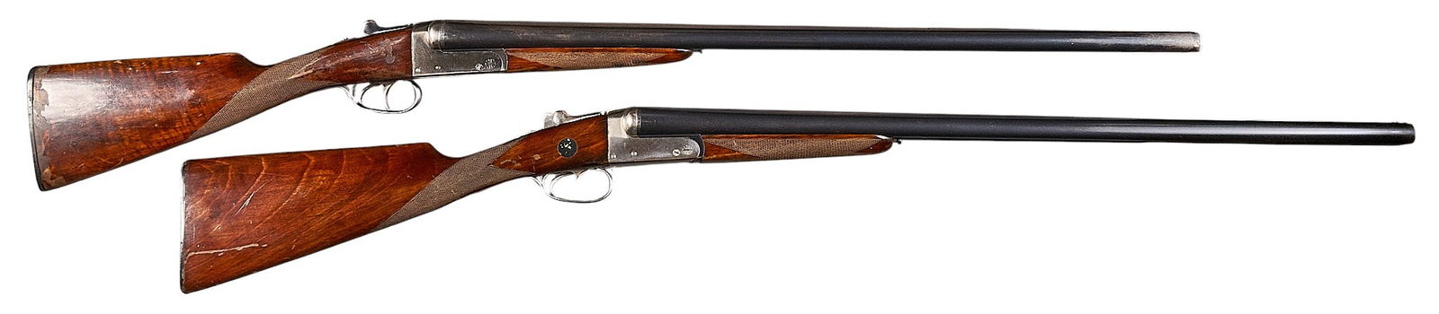 Pair of Spanish AYA Yeoman 12 Gauge SXS Shotguns: Serial: (1) 533804; (2) 547950Manufacturer: AYA-Eibar, SpainModel: YeomanCaliber: 12 GaugeBarrel length: 28 in.OAL: (1) 45.25 in.; (2) 44 in.LOP: (1) 14.75 in. (front trigger) and 13.75 in. (rear
