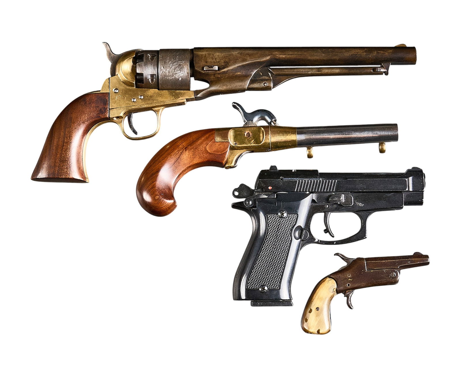 Collection of 4 Mixed Handguns: Includes: (1) Spanish Arvega 22 Short Derringer; horn grips; fair condition; No SN(2) Italian Model 85 Auto 8mm NIK blank starter pistol; w/ magazine; 63-rds of Fiocchi blanks; light handling mar