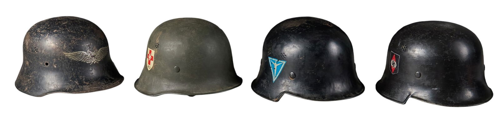 Collection of 4 WWII German Helmets: Collection of 4 WWII German helmetsIncludes: -1) M34 double-decal helmet w/ faux DRK Red Cross decals & markings; canvas liner; leather chin strap-2) Hitler Youth helmet w/ faux decals; perio