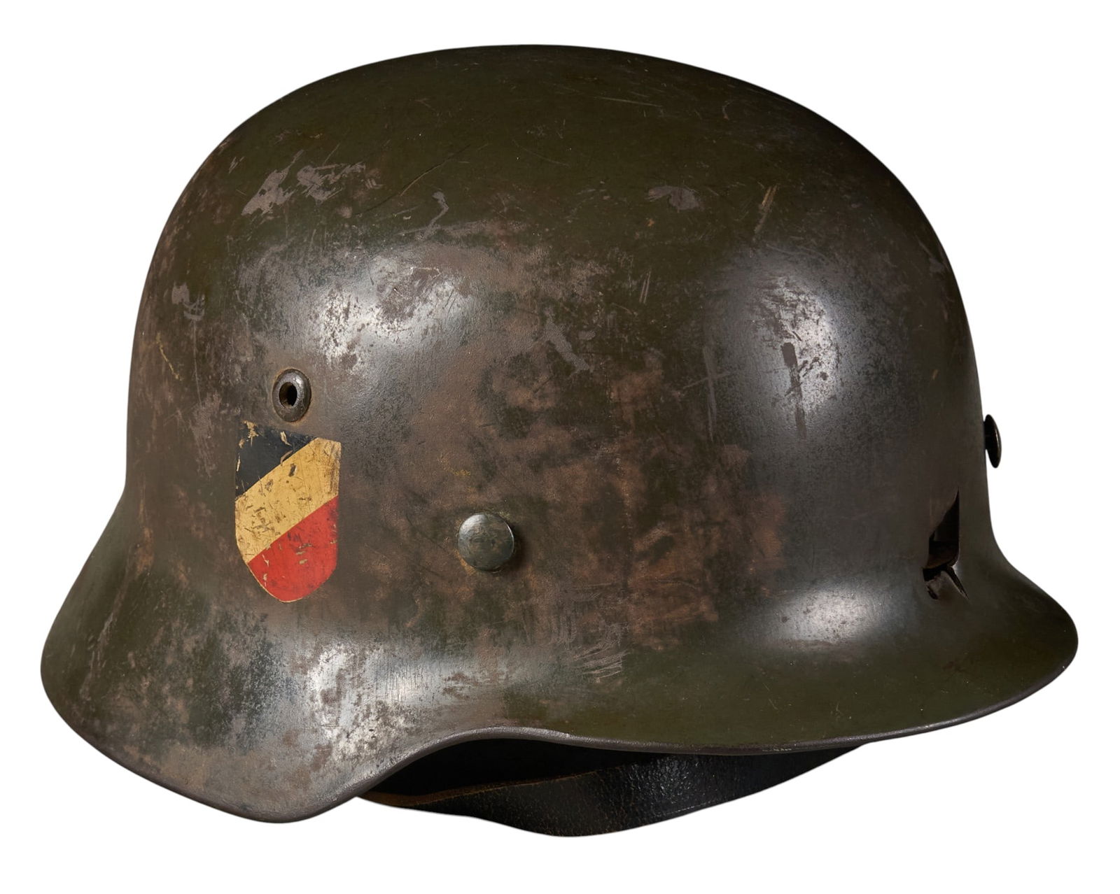 WWII German Battle Damaged M35 Wehrmacht DD Helmet: WWII German battle-damaged M35 Wehrmacht double-decal helmetIncludes: marked "R.135" & "NS.66"-decals are questionable-period liner-non-original chinstrapCondition: battle dama