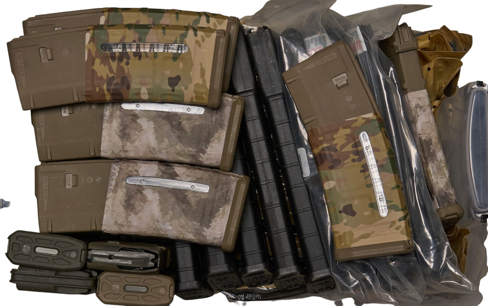 Lot of 53 Polymer AR Pattern Magazines: Includes: polymer AR pattern magazines-8 x ProMag 40-rd magazines-19 x MagPul tan 30-rd window magazines-22 x MagPul black 30-rd window magazines-4 x Magpul 30-rd magazines: (2 x black windowless, 2 x