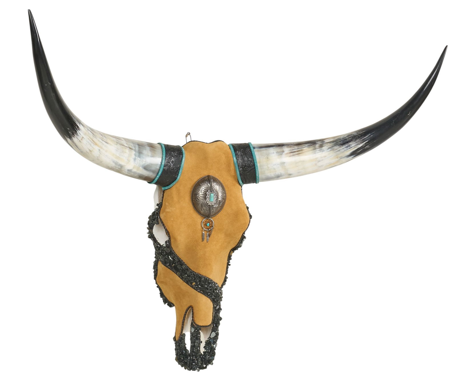 Leather Wrapped Longhorn Folk Art: Folk art longhorn skull featuring leather wrapping, turquoise and silver accents, and applied stonesheight 32 in. x width 38 in. x depth 18 in.Provenance: Property from a home in Azle, Texas