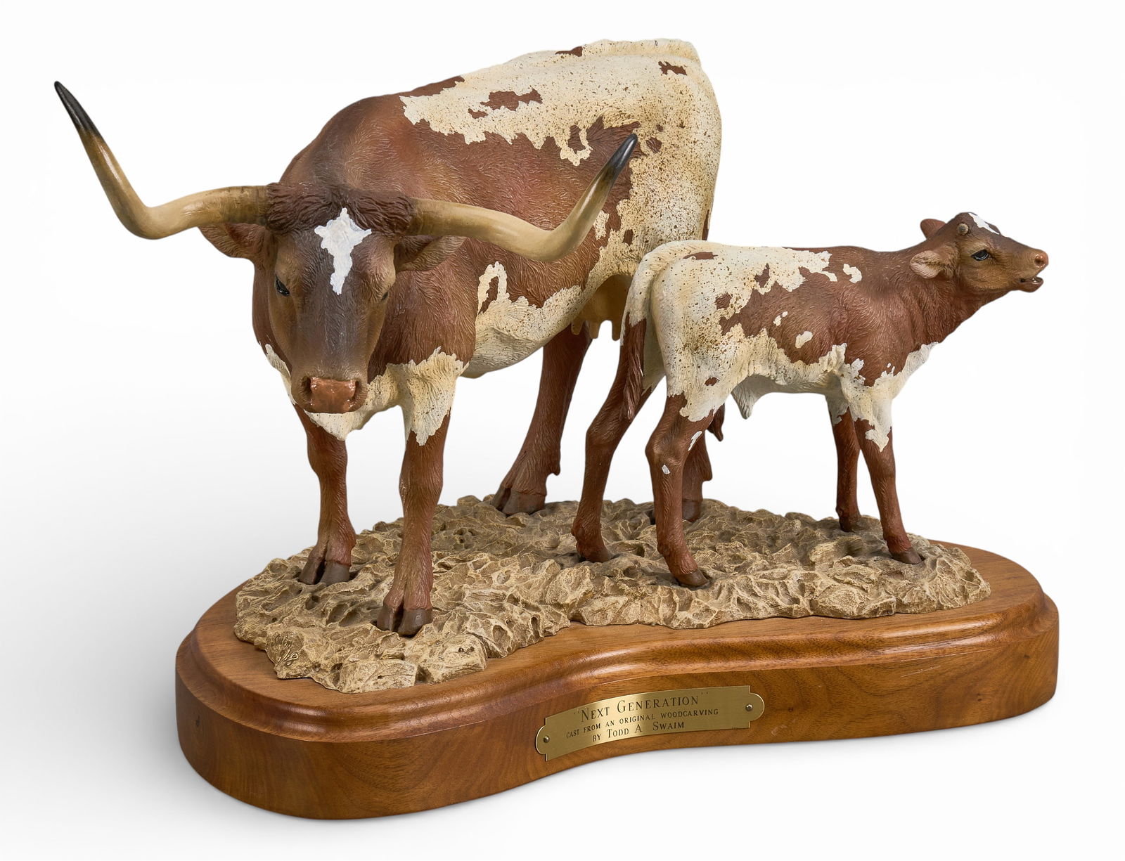 Todd Swaim, "Next Generation": Todd A. Swaim(Arizona, b. 1965), "Next Generation", artist-cast bronze sculpture cast from an original woodcarving on rotating wooden base, incised signature and edition number,