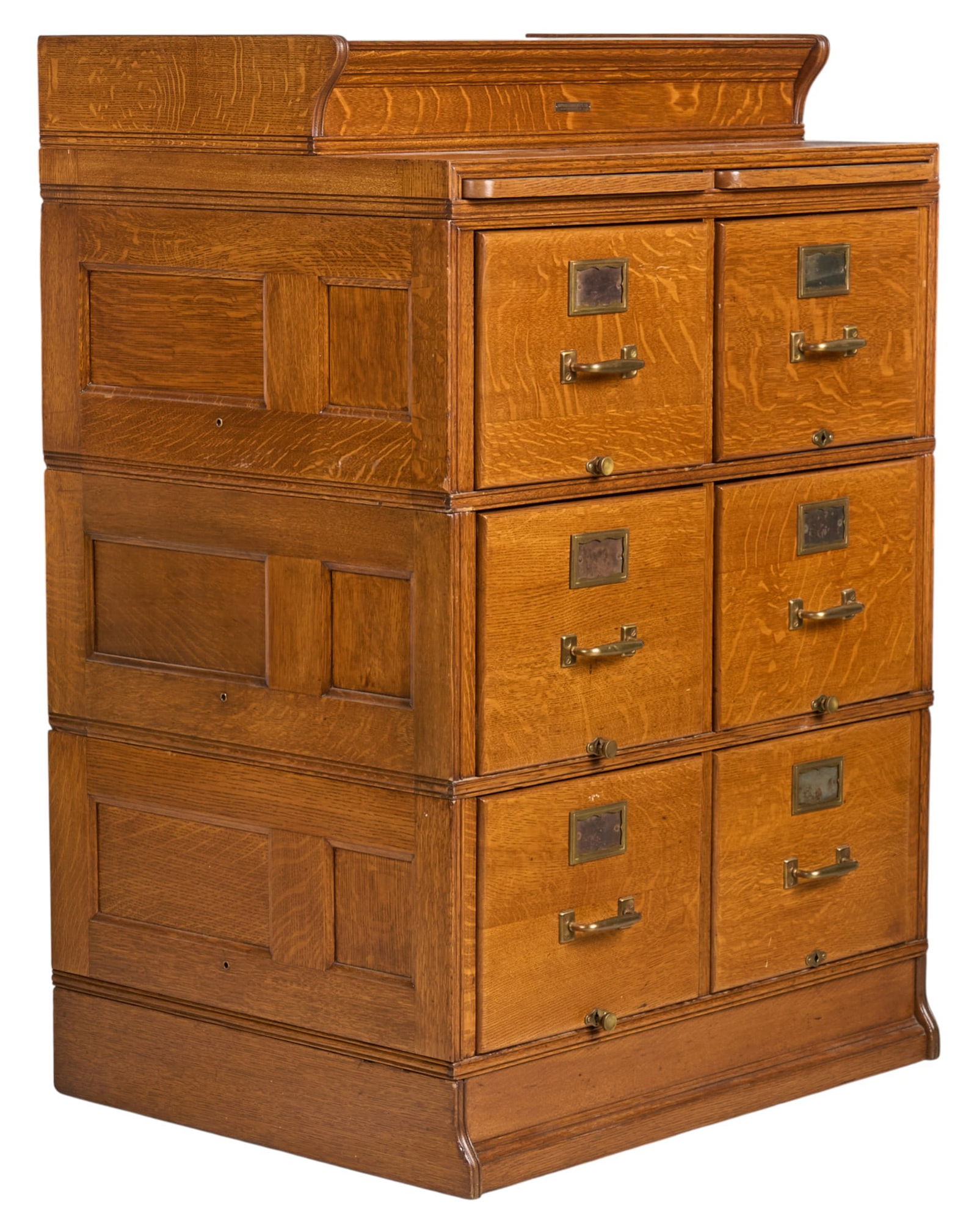 Antique Yawman & Erbe Filing Cabinet: Antique Yawman & Erbe Manufacturing Co (Rochester, New York) filing cabinet with six drawers with brass pulls and card holders below two extending leaves, composed of three modular sections,