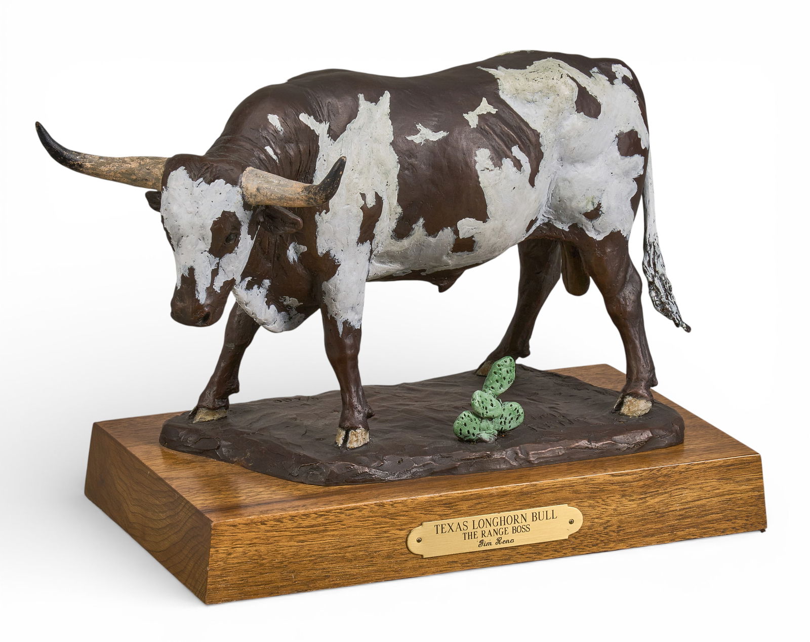 Jim Reno, "The Range Boss": Jim Reno, "Texas Longhorn Bull: The Range Boss", artist-cast cold-painted bronze sculpture on rotating wooden base, incised signature and edition number, 5/300height 9 in. x width