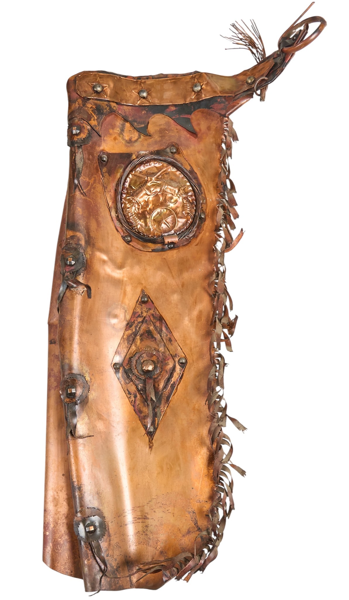 Copper Cowboy Chaps: Copper cowboy chaps sculpture with decorative metal tassels and conchosheight 38 in. x width 18 in. x depth 5 in.Provenance: Property from a home in Ingram, Texas