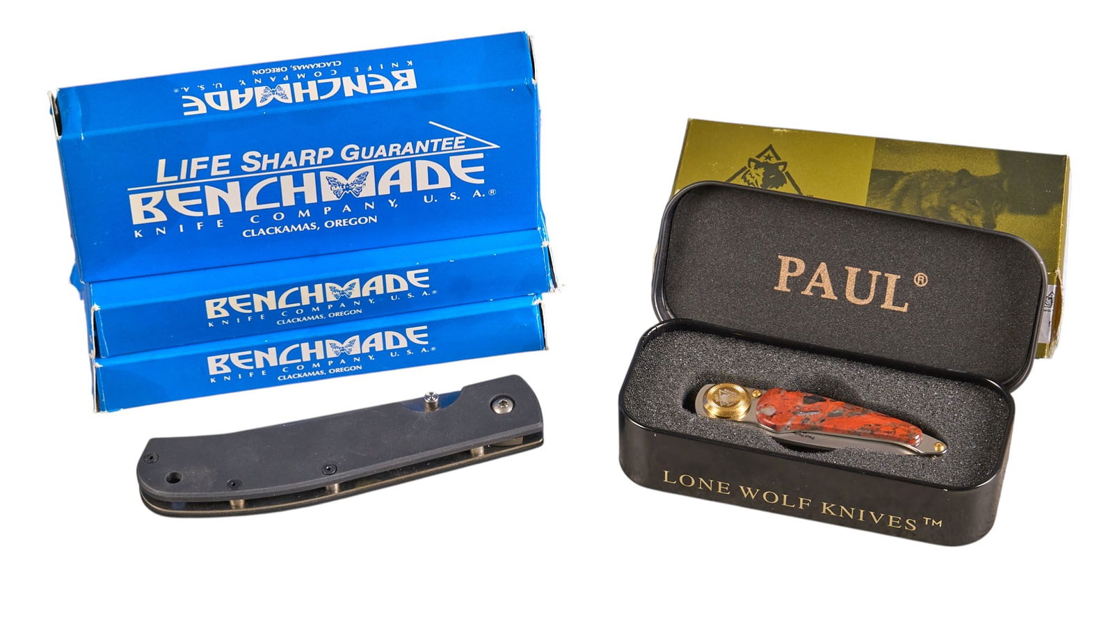 (3) Benchmade Tsunami Tanto & Lone Wolf Knives Paul Perfecto: Includes:-3 Benchmade Model #700-S Tsunami Tanto Folder Serrated Knives in Factory Box - Lone Wolf Knives Paul Perfecto "Passion Stone" in Factory Box & Tin Provenance: A Helotes,