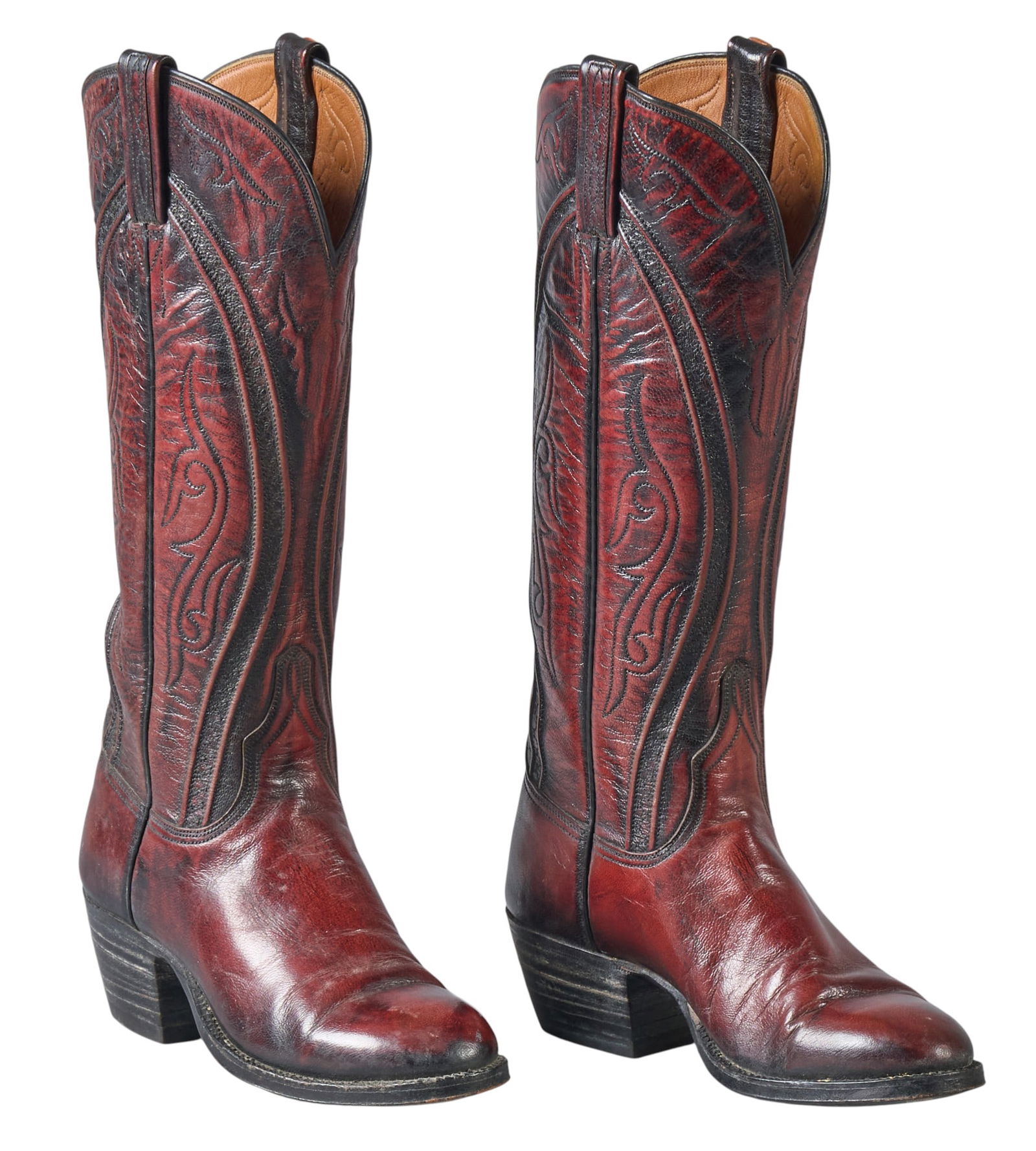 Lucchese Woman's Boots, 4 1/2 B: Pair of Lucchese women's boots of tooled reddish brown leather, includes original box size 4 1/2 Bheight 14.5 in. x width 3.25 in. x depth 9.25 in. Provenance: Property from a home in