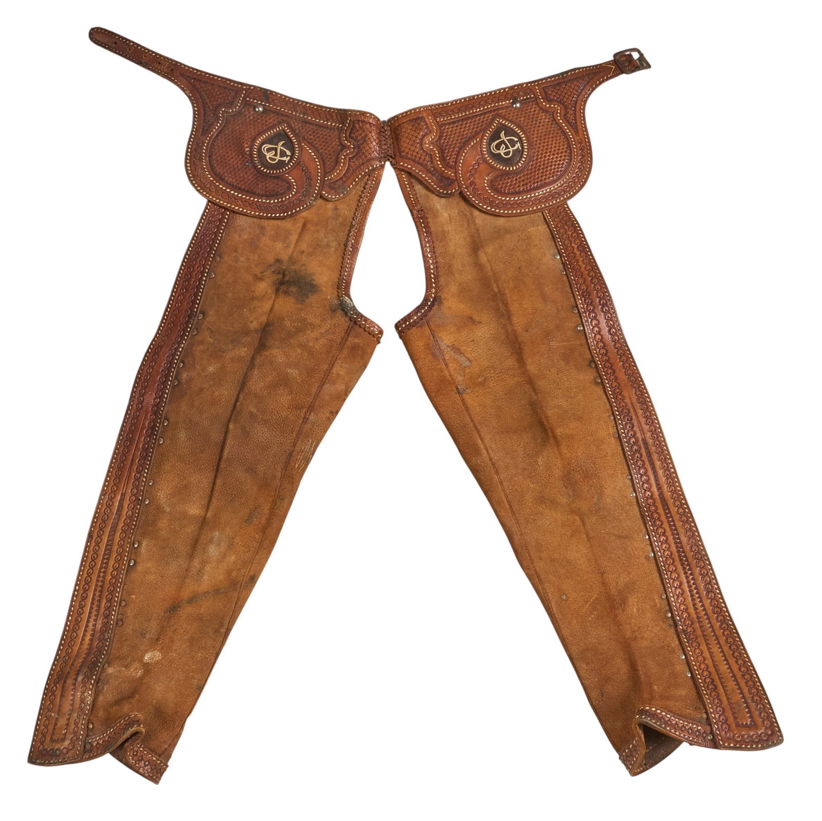 Pair of Mexican Chaps: Pair of Mexican leather riding chaps with tooled waist and trim length 40 in. x width 34 in. Provenance: Property from a home in San Antonio, Texas