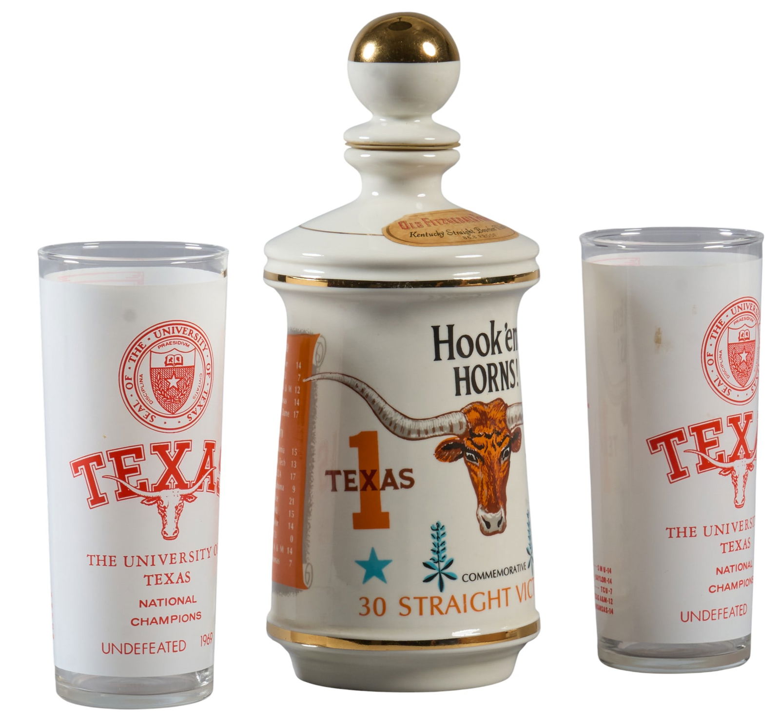 University of Texas Championship Decanter & Glasses Set: University of Texas commemorative decanter and two glasses, decanter commemorating thirty straight victories, glasses featuring the UT logo and "Texas National Champions